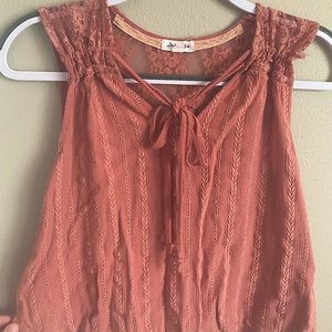 Size Small, Color Blush, Lace and patterned, Two string tie and adjustable